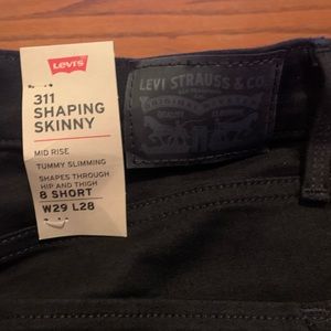 Levi’s 311 shaping skinny black jeans